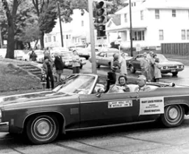 Black and white photo of Homecoming grand marshals